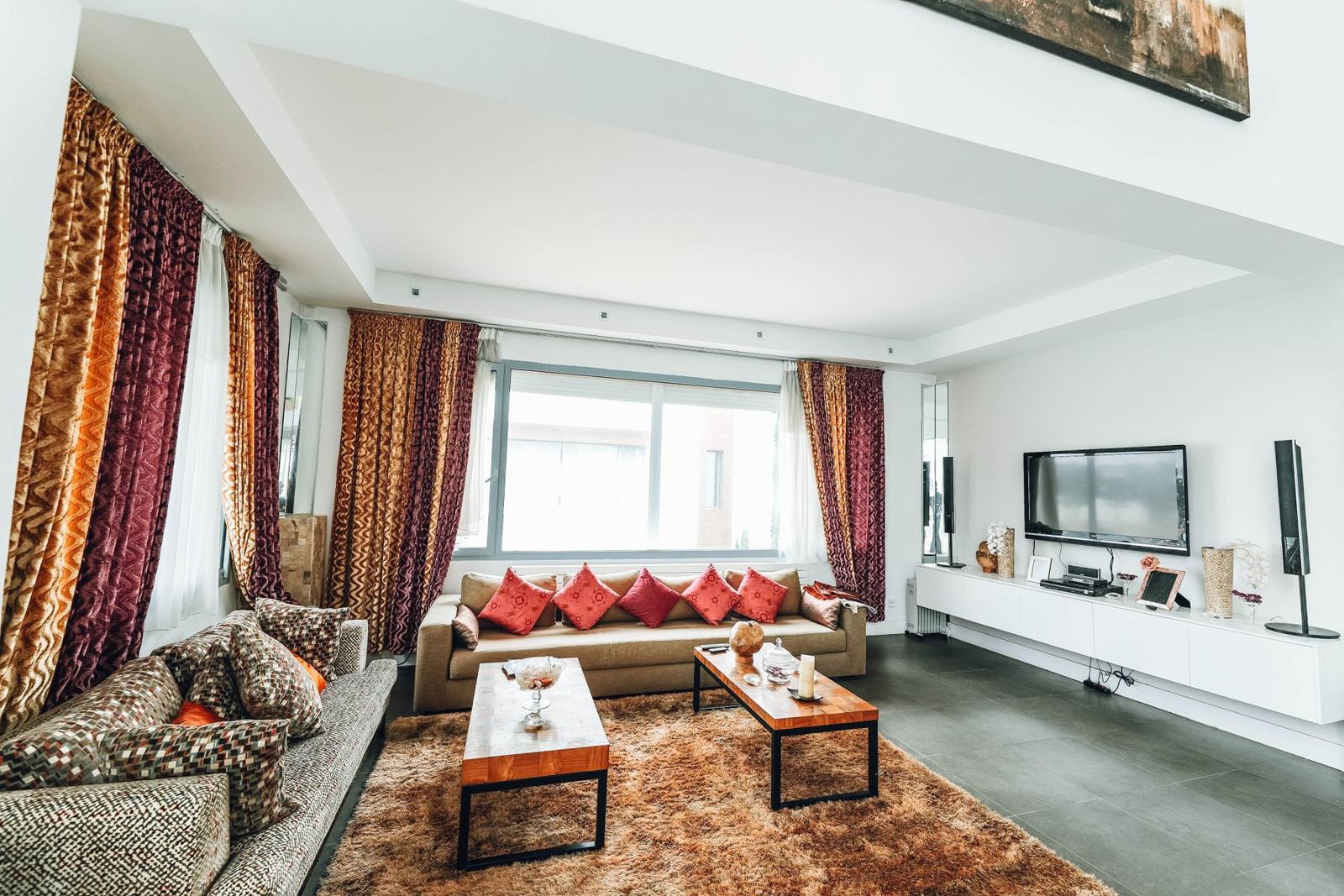 A bright living room with a bay window